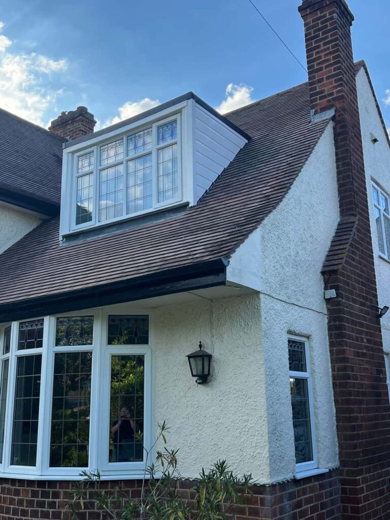 This is a photo of a dormer window which has just had some repairs carried out where the roof and the dormer meet. Works carried out by Cowplain Roofing Repairs